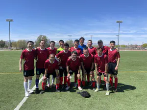 Chinese soccer tournament 40+ age group at Las Vegas. Team photo with the former Chinese National Soccer Team Captain Du Wei (the tallest player in blue)