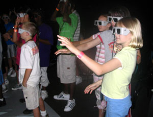 Campers get a tour of the Envision Centers Virtual Reality Theatre. 