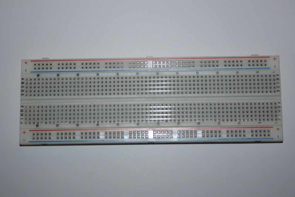The breadboard XPCI-CT system. (a) A photograph of the system, with