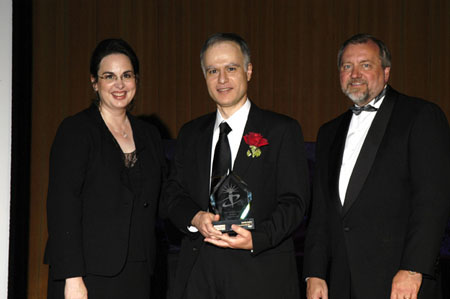 Mike Atallah accepts a Mira award
