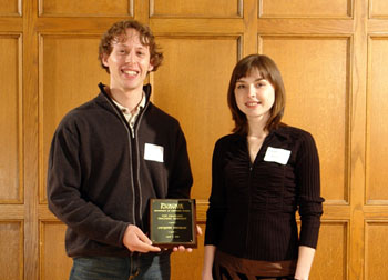 Graduate Student Board President, Marina Blanton presented the Top Graduate TA award to Jacques Thomas. 