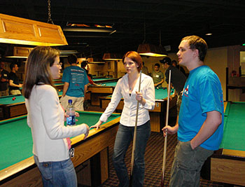 Students playing pool