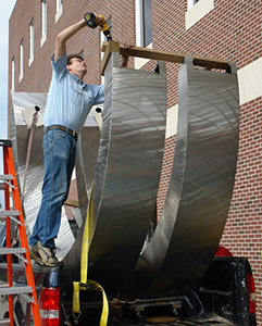 Working on the sculpture