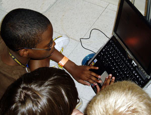 Campers work with robotics during advanced camp. 