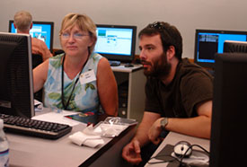 Ethan Blanton, Graduate Teaching Assistant, assists Vicki Geheb