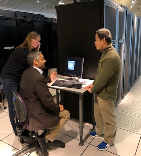 L-R: Lori Floyd, CERIAS office manager, Purdue University; Dr. Ken Patel, Sanager of Purdue partnerships, Sandia National Labs; Professor Dongyan Xu, CERIAS director