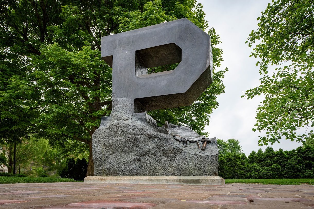 The "Unfinished Block P" serves as a reminder that even after graduating from Purdue, our experience is not over. Rather, we carry through life our numerous memories, friendships, lessons learned, and skills acquired. The "Unfinished Block P" is an emblem encouraging all Purdue students, alumni, and friends to treasure all that Purdue has blessed us with and to keep the Purdue experience close at heart, not only for ourselves but for all that we loved here and for all those students who, for various reasons, did not get the opportunity to complete the Purdue experience. In essence, the real Purdue is not simply the physical facility or the location of the University, but the cumulative and lasting impact and wonder of our interactions with faculty, staff, other students, and all the events that occur during our time together. Once a part of the experience, we are all eternally Purdue.
