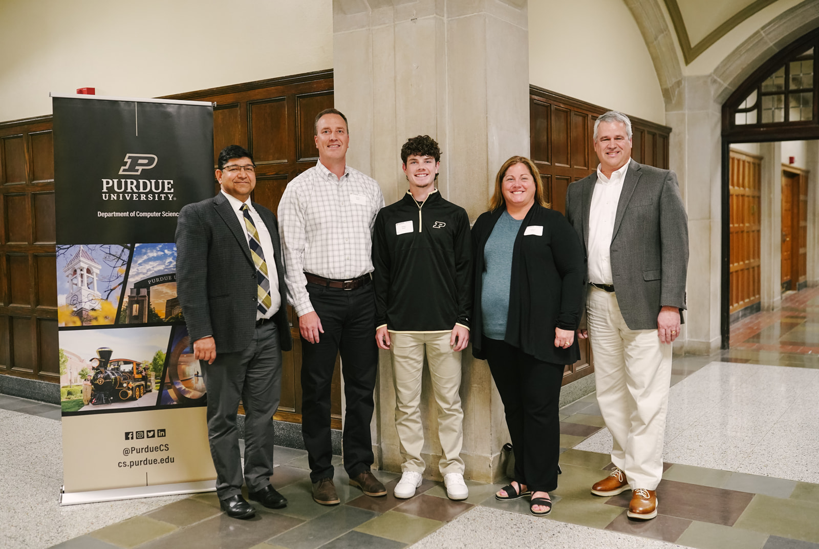 Nathan Walsh with his family, Professor Sunil Prabhakar, and Assistant Head Randy Bond