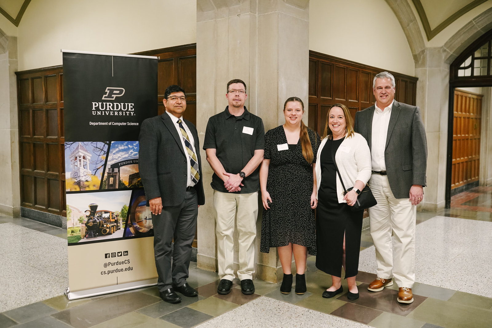 Grace Cantrell with her family, Professor Sunil Prabhakar, and Assistant Department Head Randy Bond