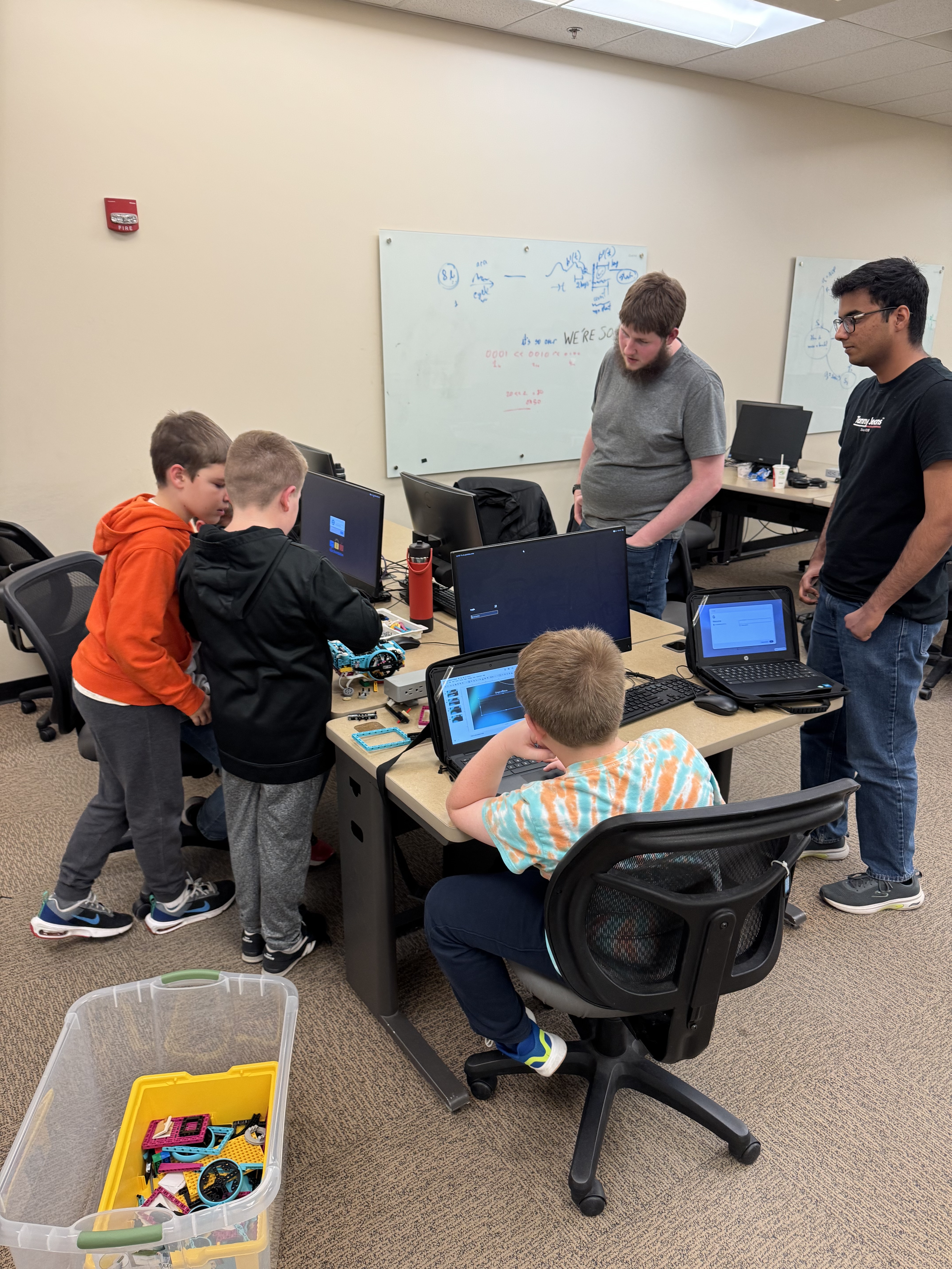 students mentor FLL team